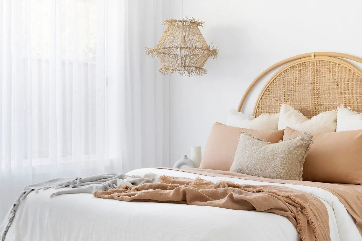 The Secret to a Luxe Bedroom Look? Cushions That Layer Like a Dream