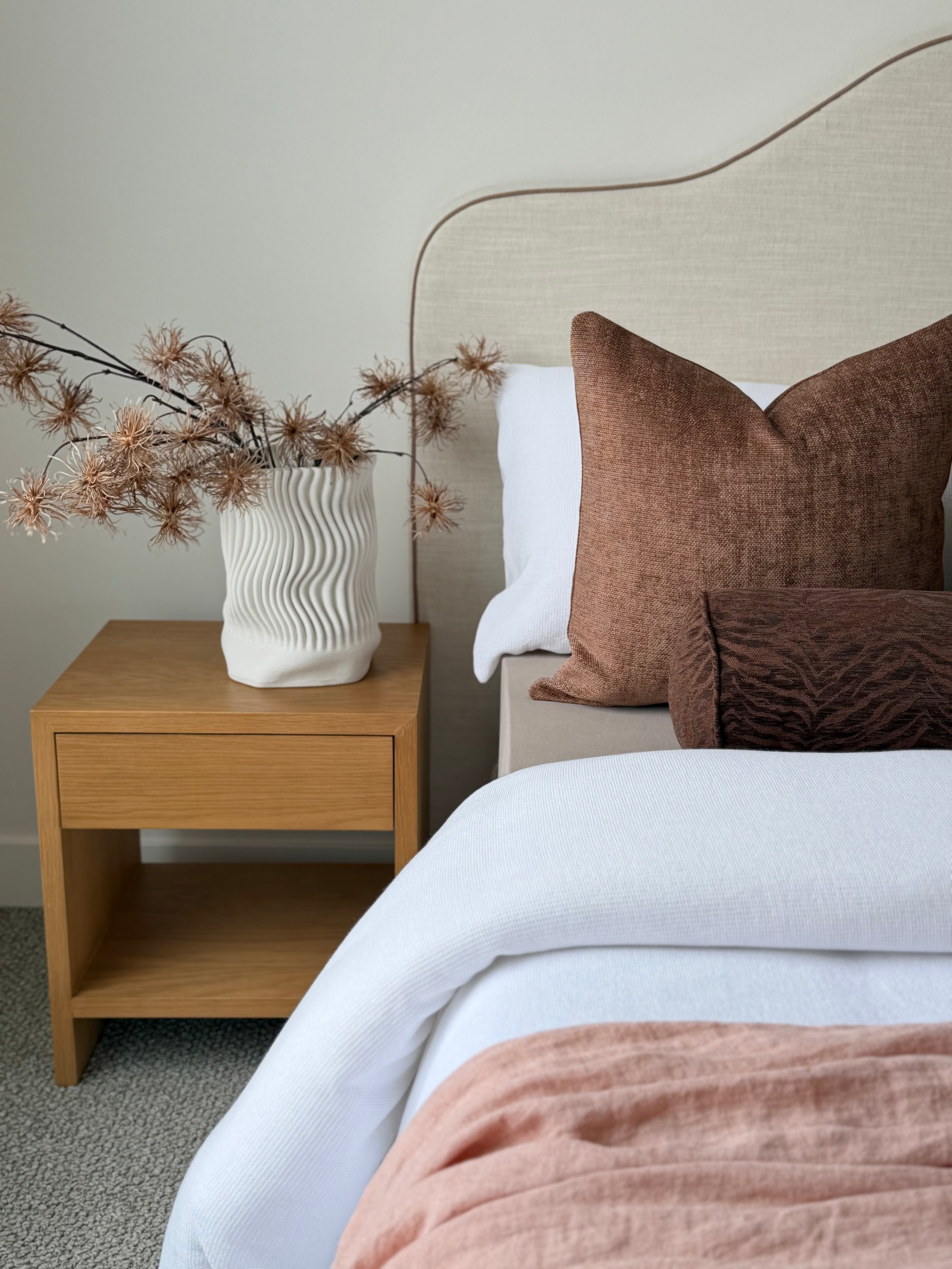 Temba Cocoa long bolster cushion, organic woven pattern in cocoa and earthy brown